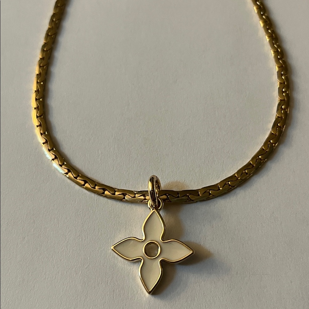 Gold Flower Pendant on Curb link Chain